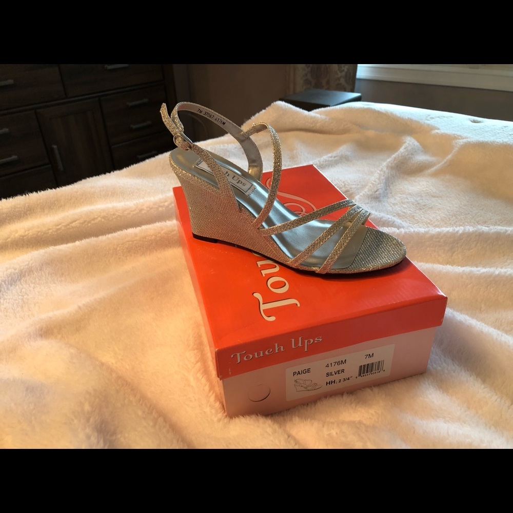 Silver wedge sandals.
